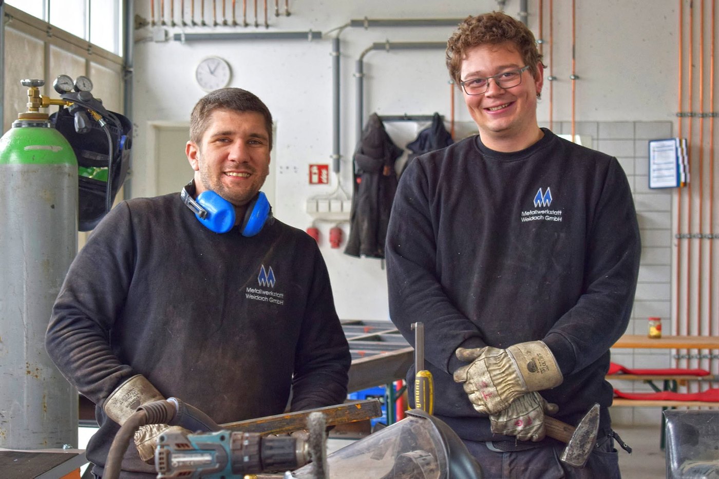 Team der Metallwerkstatt Weidach in der Werkstatt